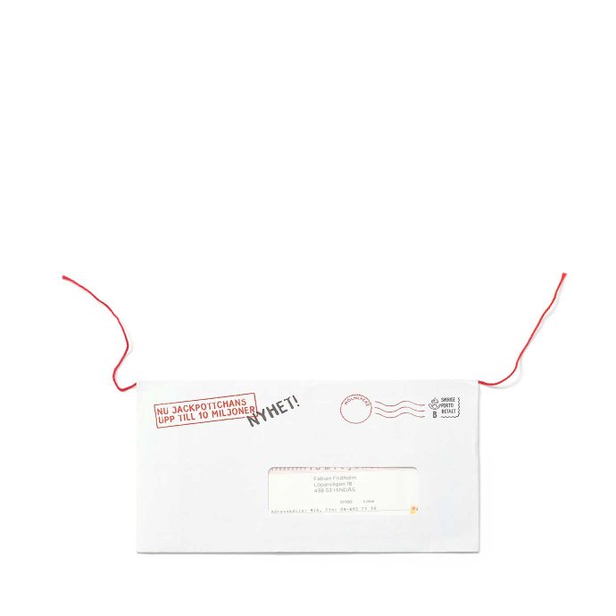 Adresserad direktreklam "Vinnarkuvert" för Miljonlotteriet, med inlimmat snöre för att sprätta kuvertet.