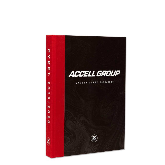 Inbunden katalog "Accell Group" med tygklädd rygg med vit foliering.