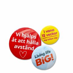 Ett urval kampanjknappar i olika storlek.