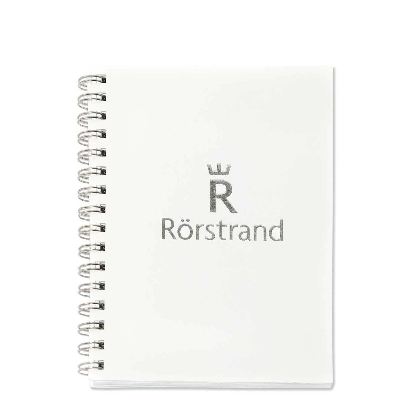Anteckningsbok "Rörstrand" med Wire-o, med positiv prägling och silverfoliering av logo "Rörstrand".