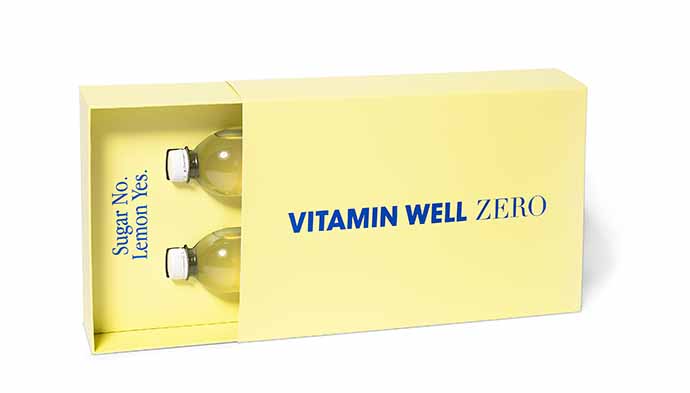Rigid box med sleeve "Vitamin Well", med inrede för 2 flaskor.