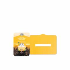 Hyllkantspratare i papp "Paulig", som fäst på hyllkanten runt prisskylten. Bilden till vänster kan sedan vikas ut 90 grader från hyllan. Kan även kallas "prisskyltspush".